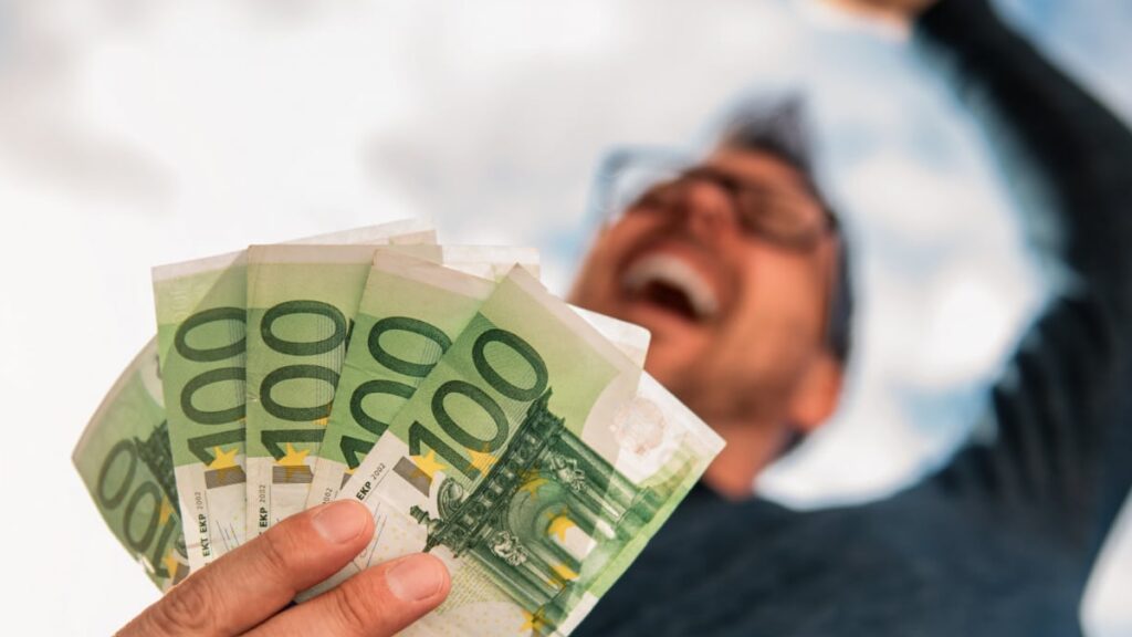 man holding money